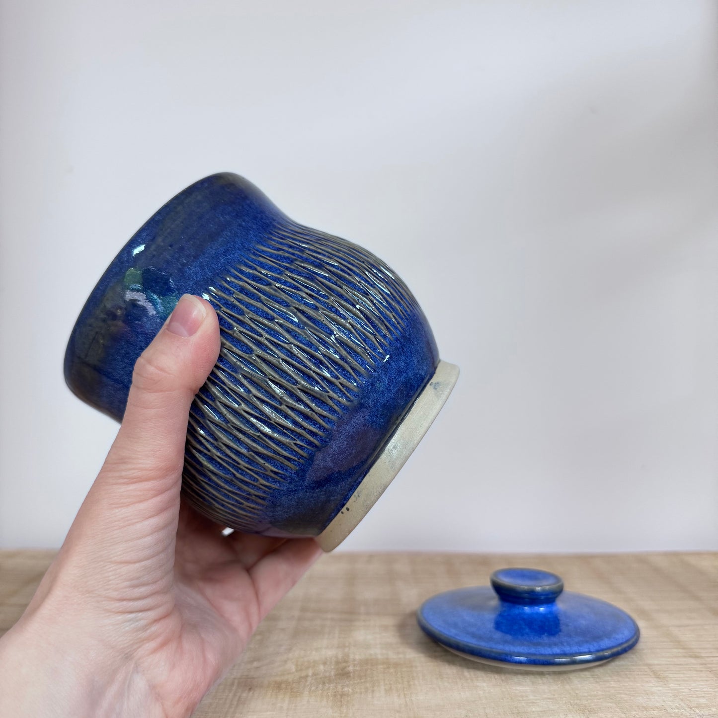 Dekselpot in hand