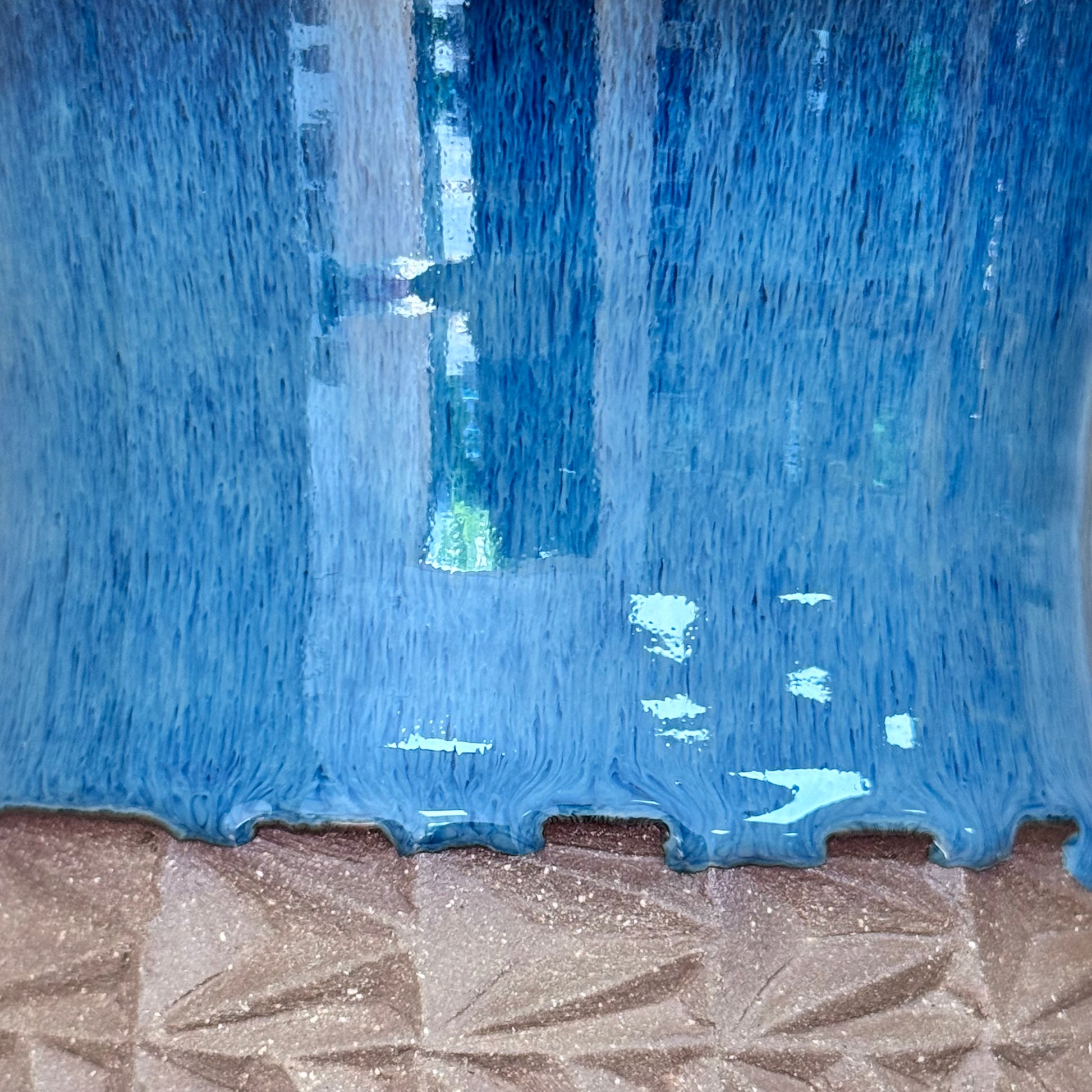 Handmade blue ceramic vase detail