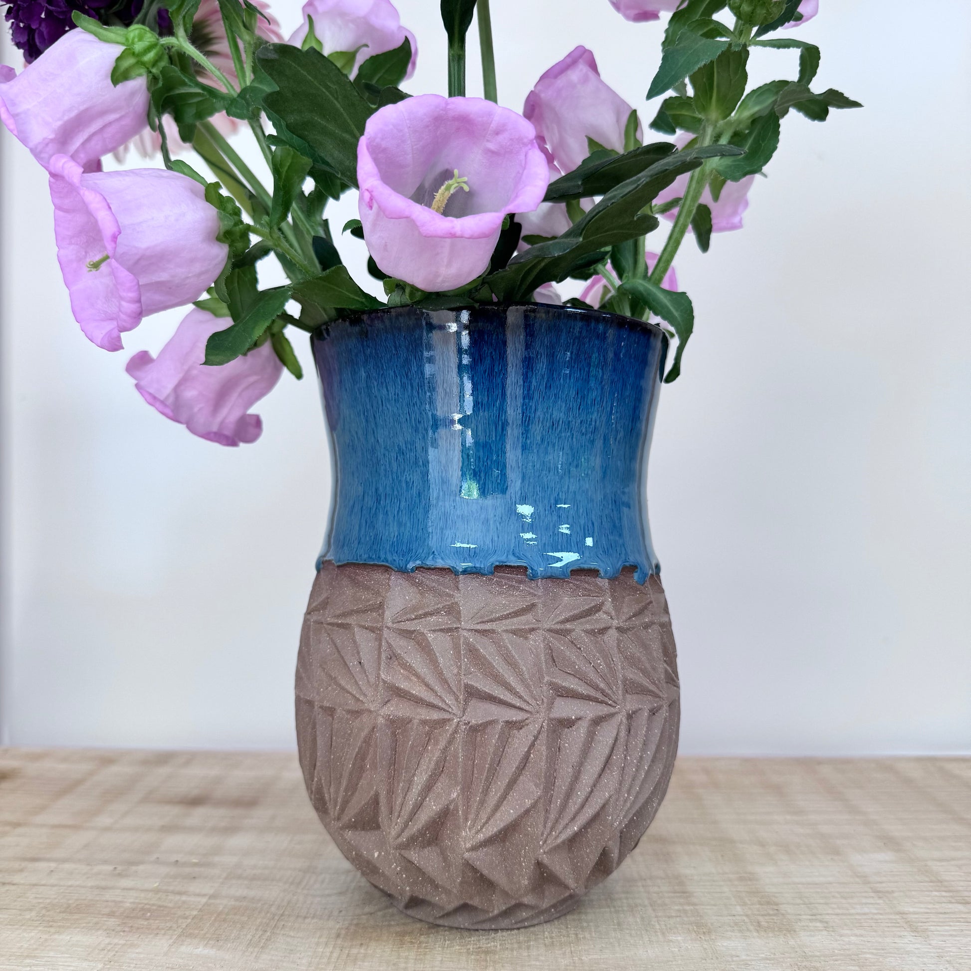Handmade blue ceramic vase flowers