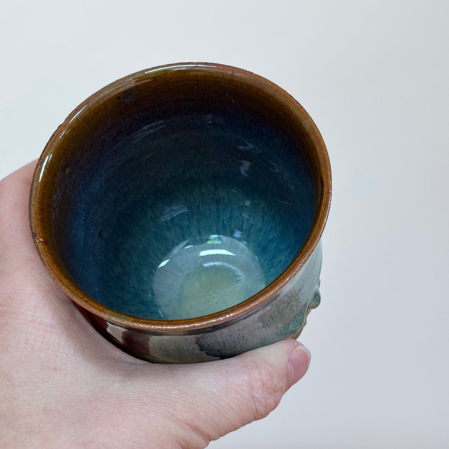 Handmade carved cup green detail inside