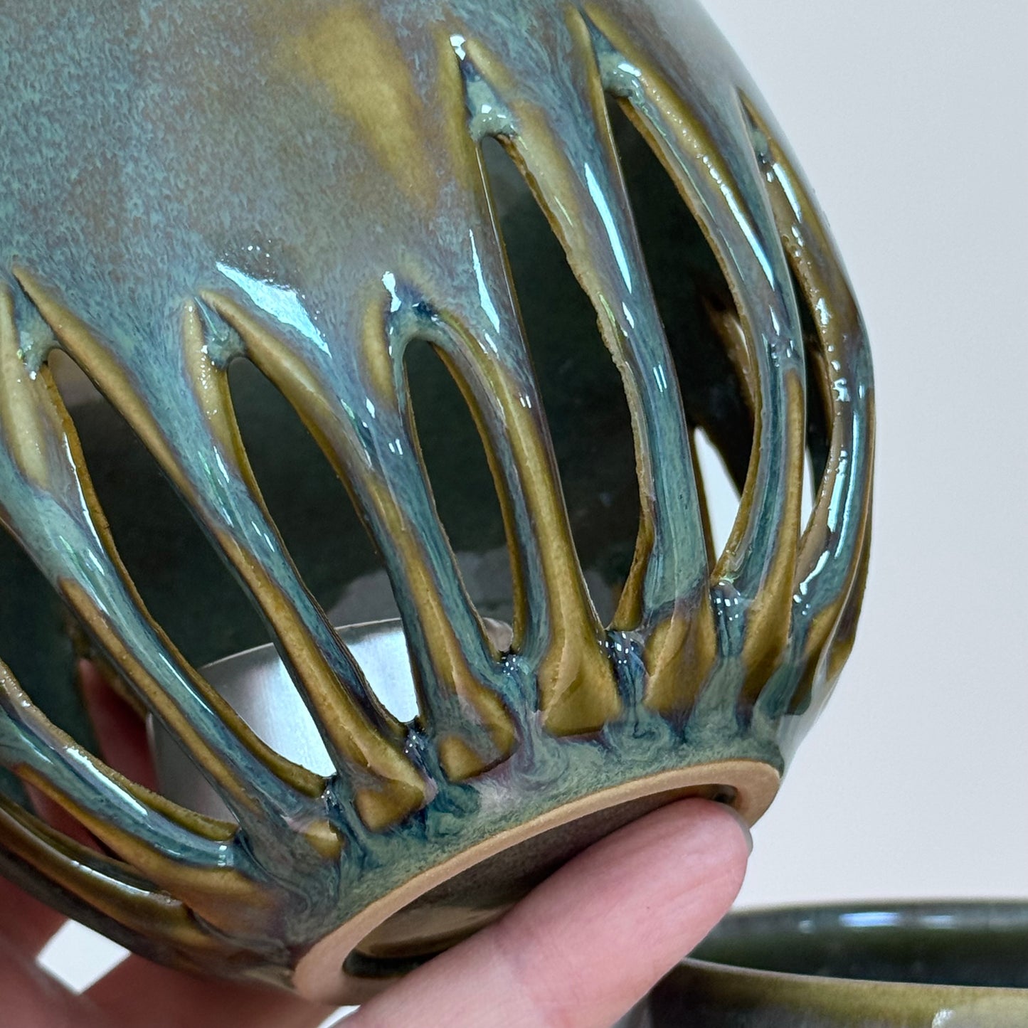 Handmade ceramic candle holders detail one