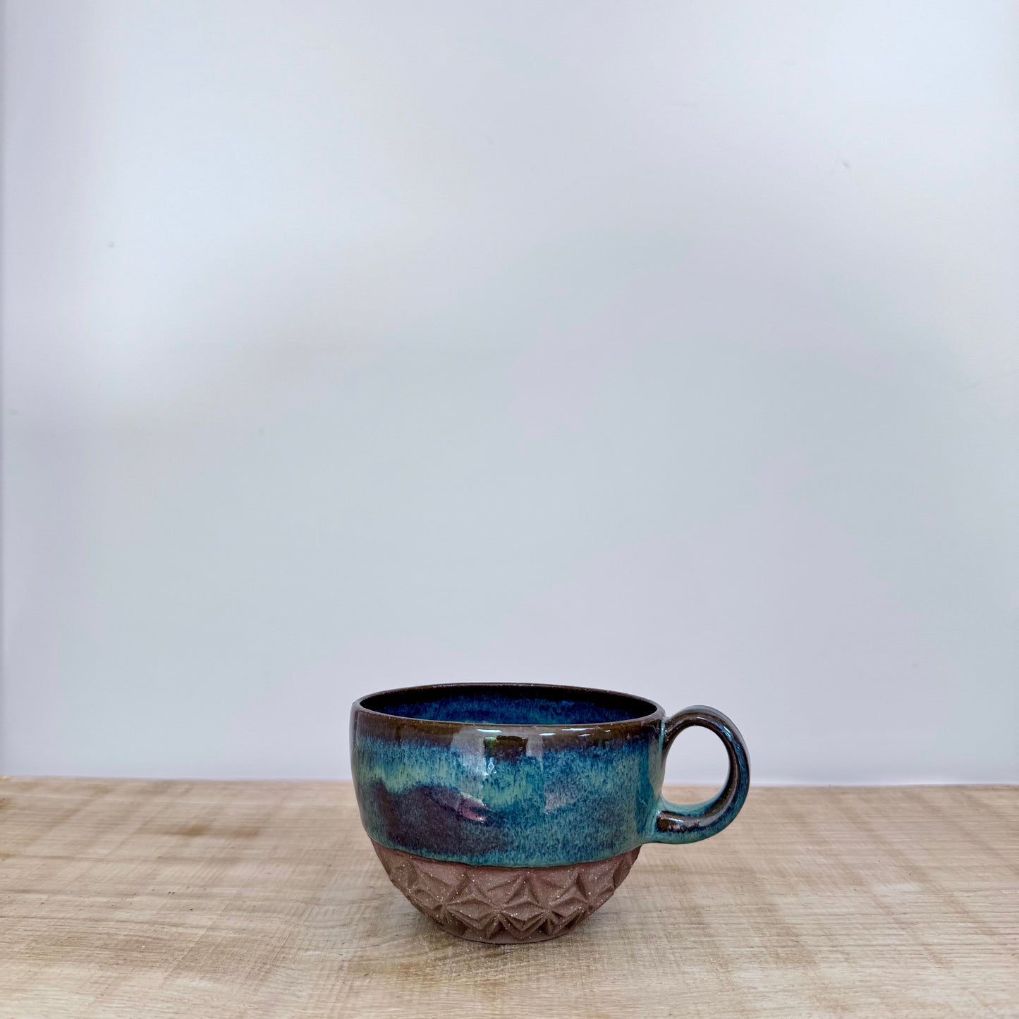 Handmade ceramic cappuccino cup carved green