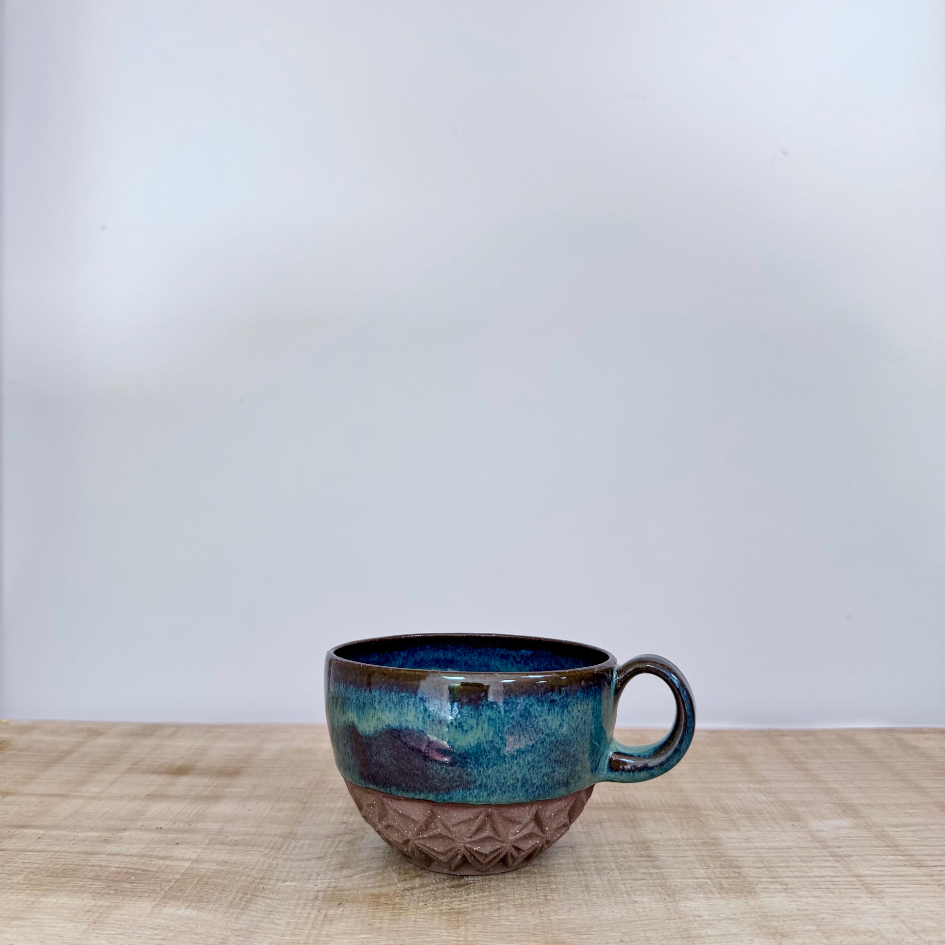 Handmade ceramic cappuccino cup carved green