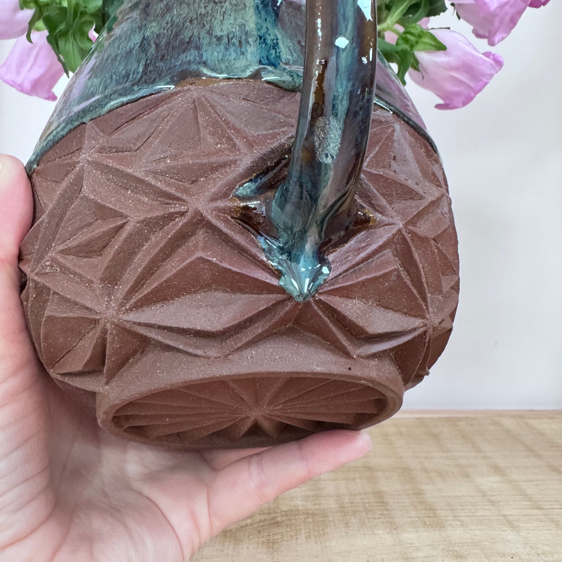 Handmade ceramic jug big carving detail