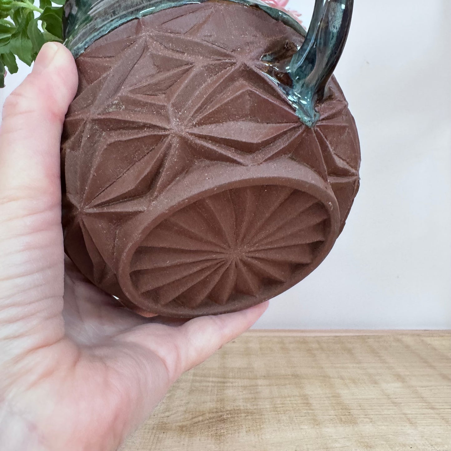 Handmade ceramic jug big foot detail