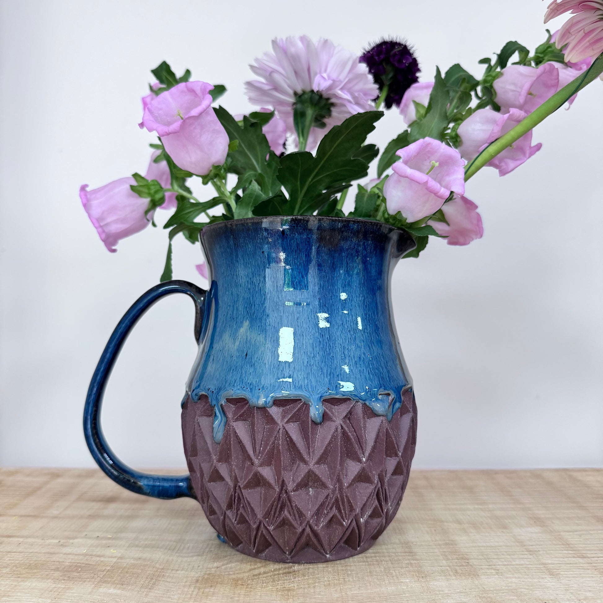 Handmade ceramic jug side