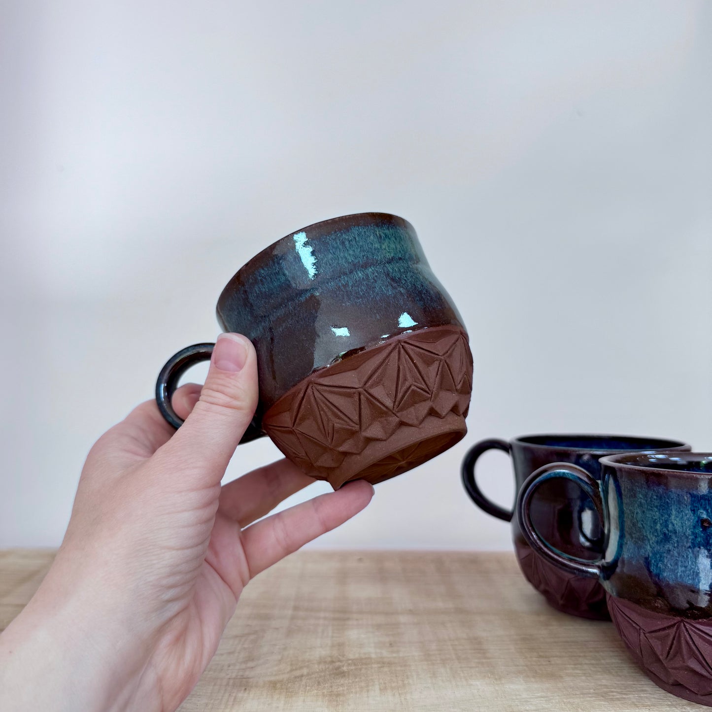 Handmade ceramic mugs carved 1