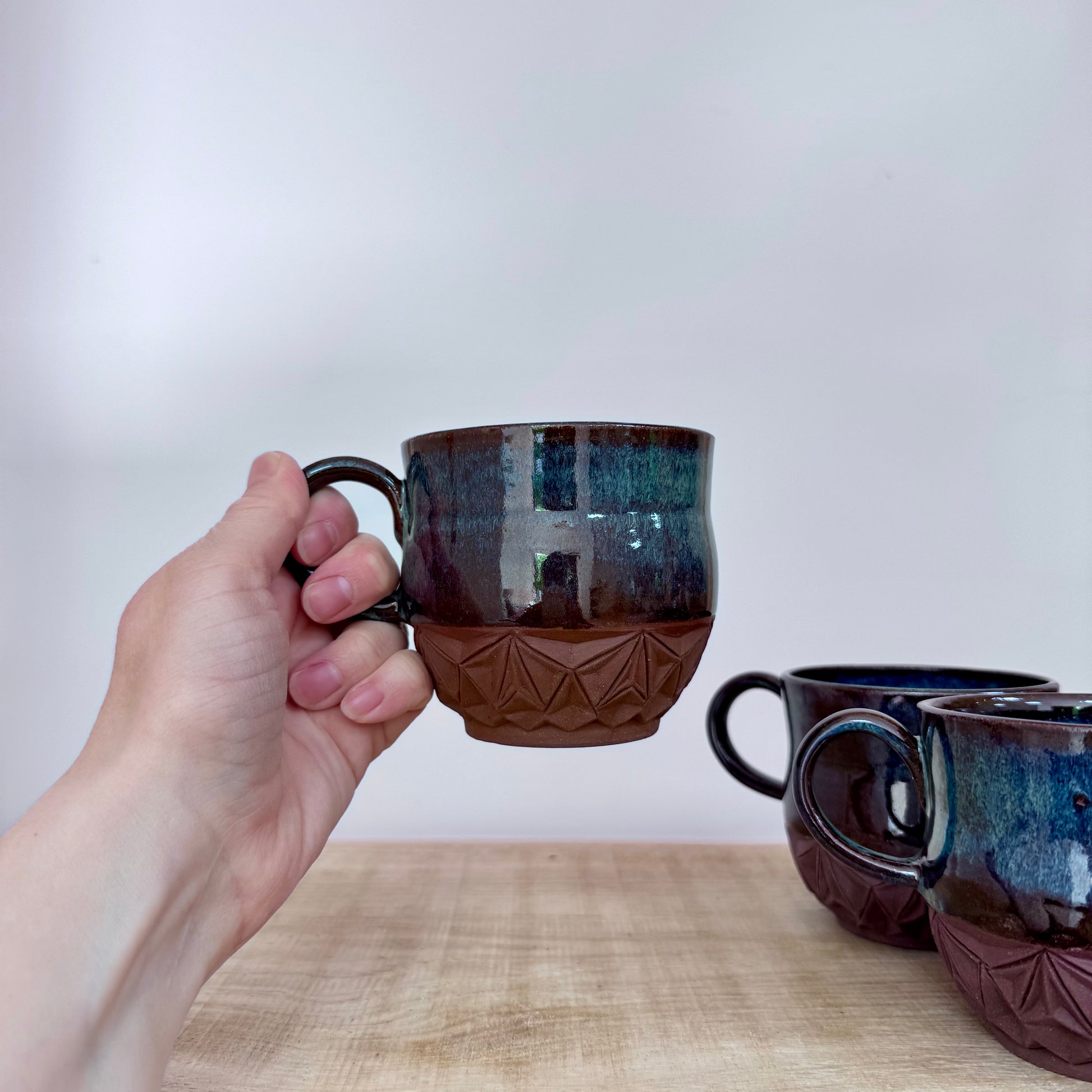 Handmade ceramic mugs carved 2