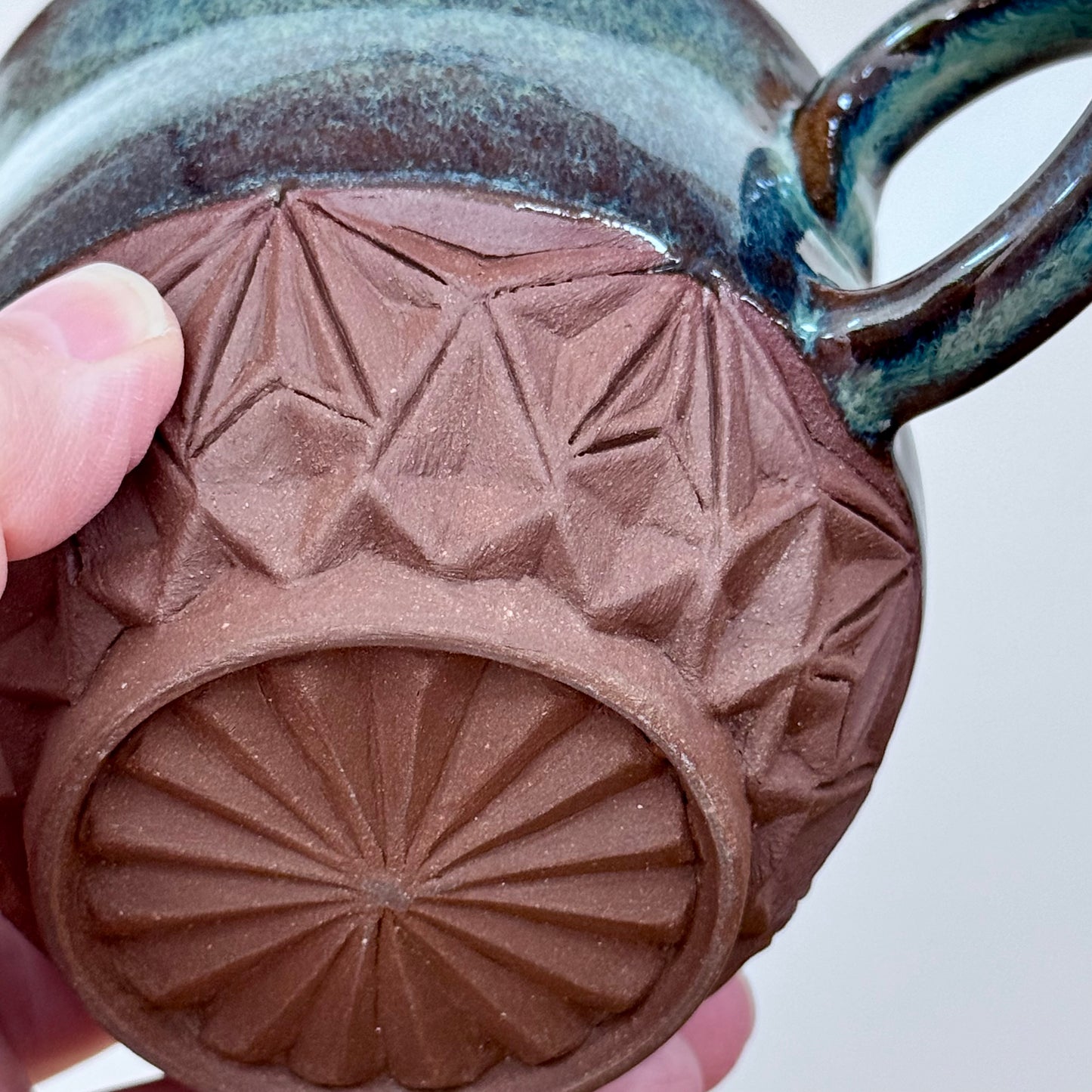 Handmade ceramic mugs carved foot