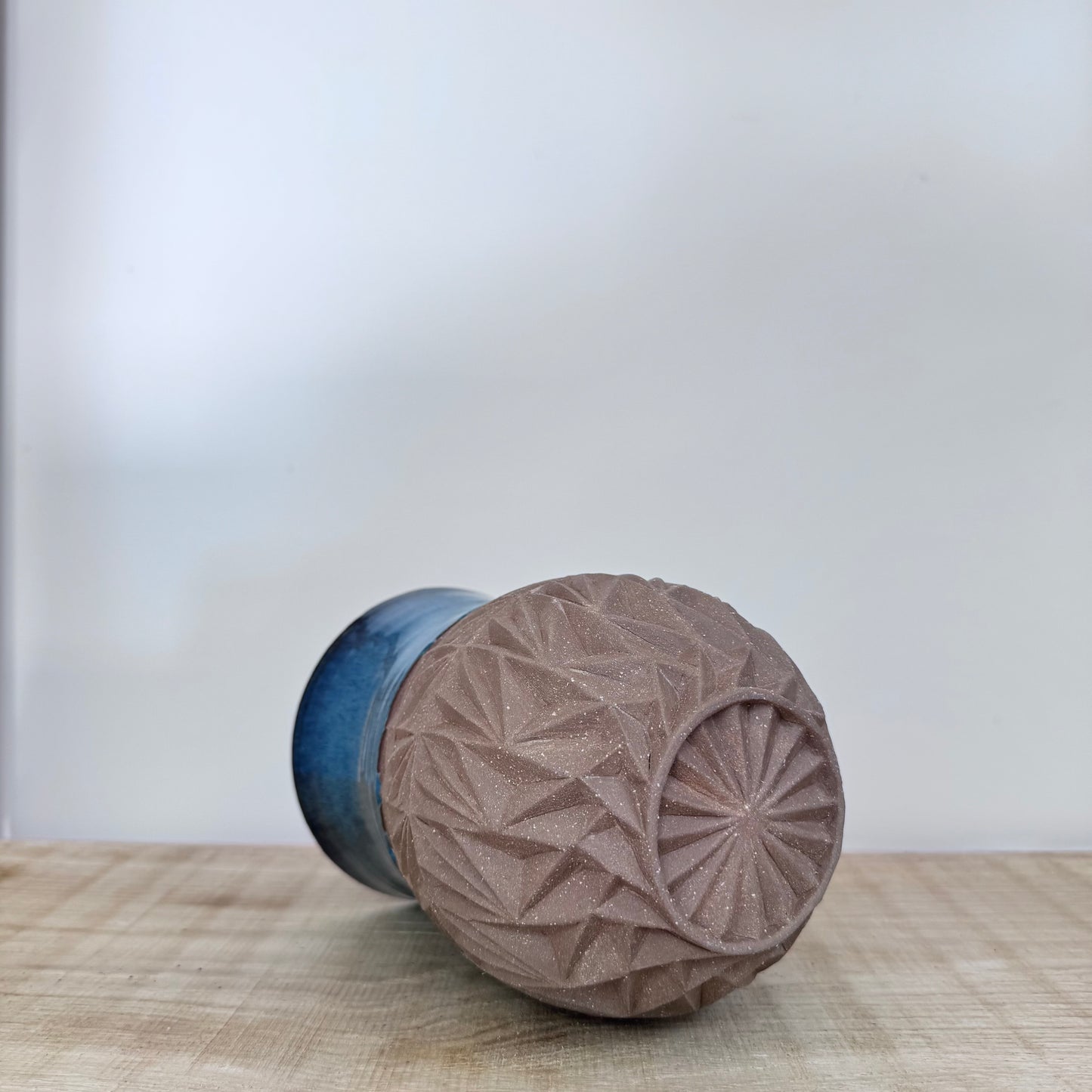 Handmade ceramic vase carving detail foot blue