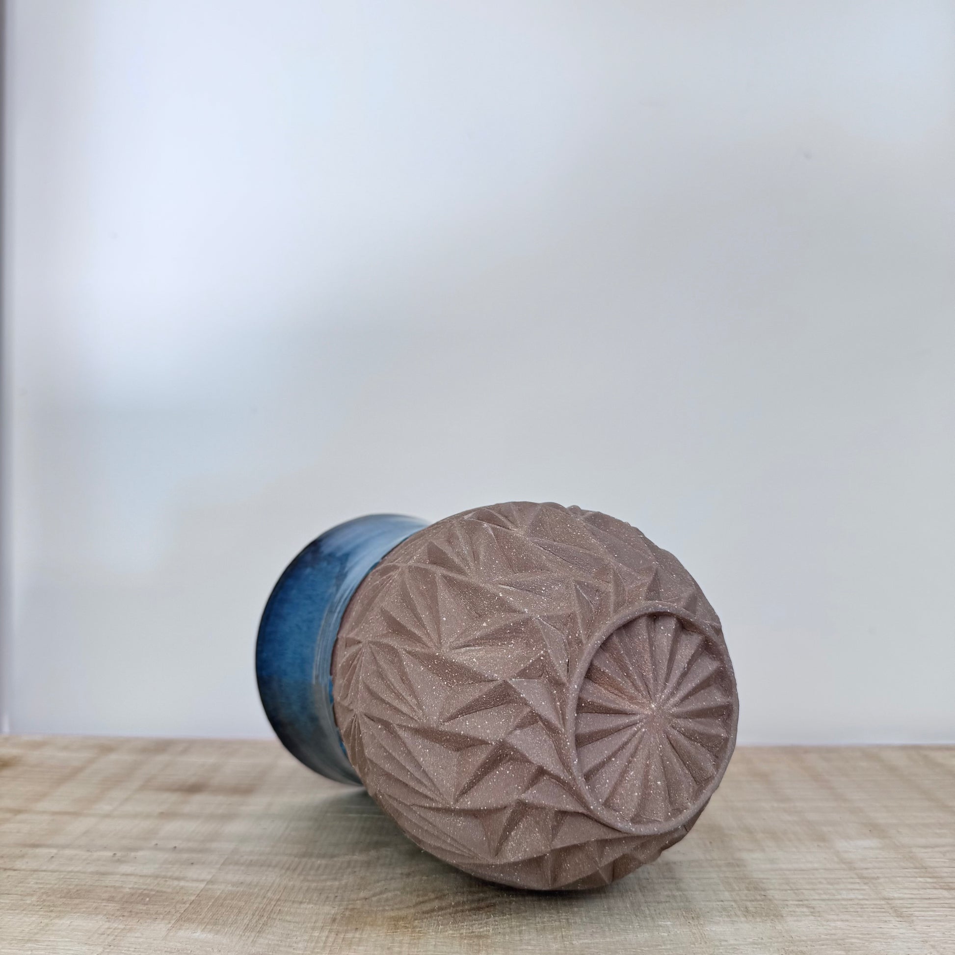Handmade ceramic vase carving detail foot blue