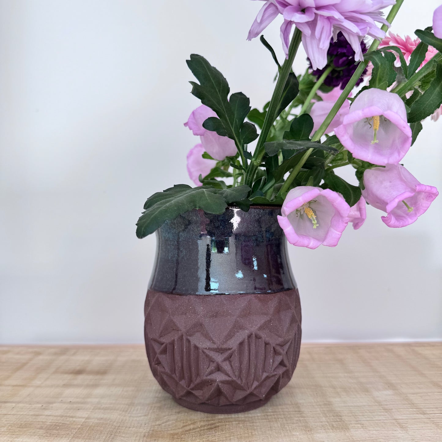 Handmade ceramic vase with flowers