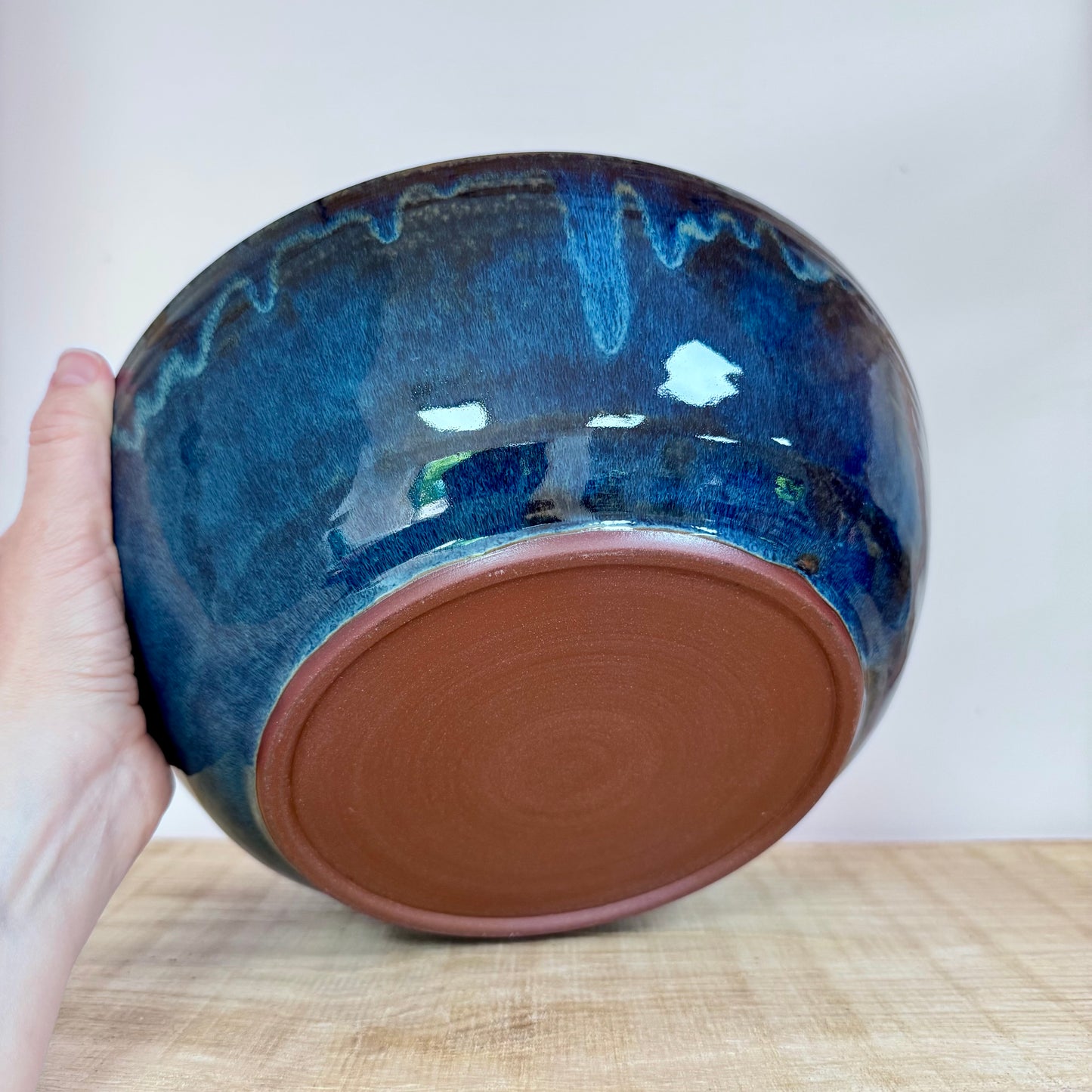 Handmde ceramic bowl carved blue inside bottom