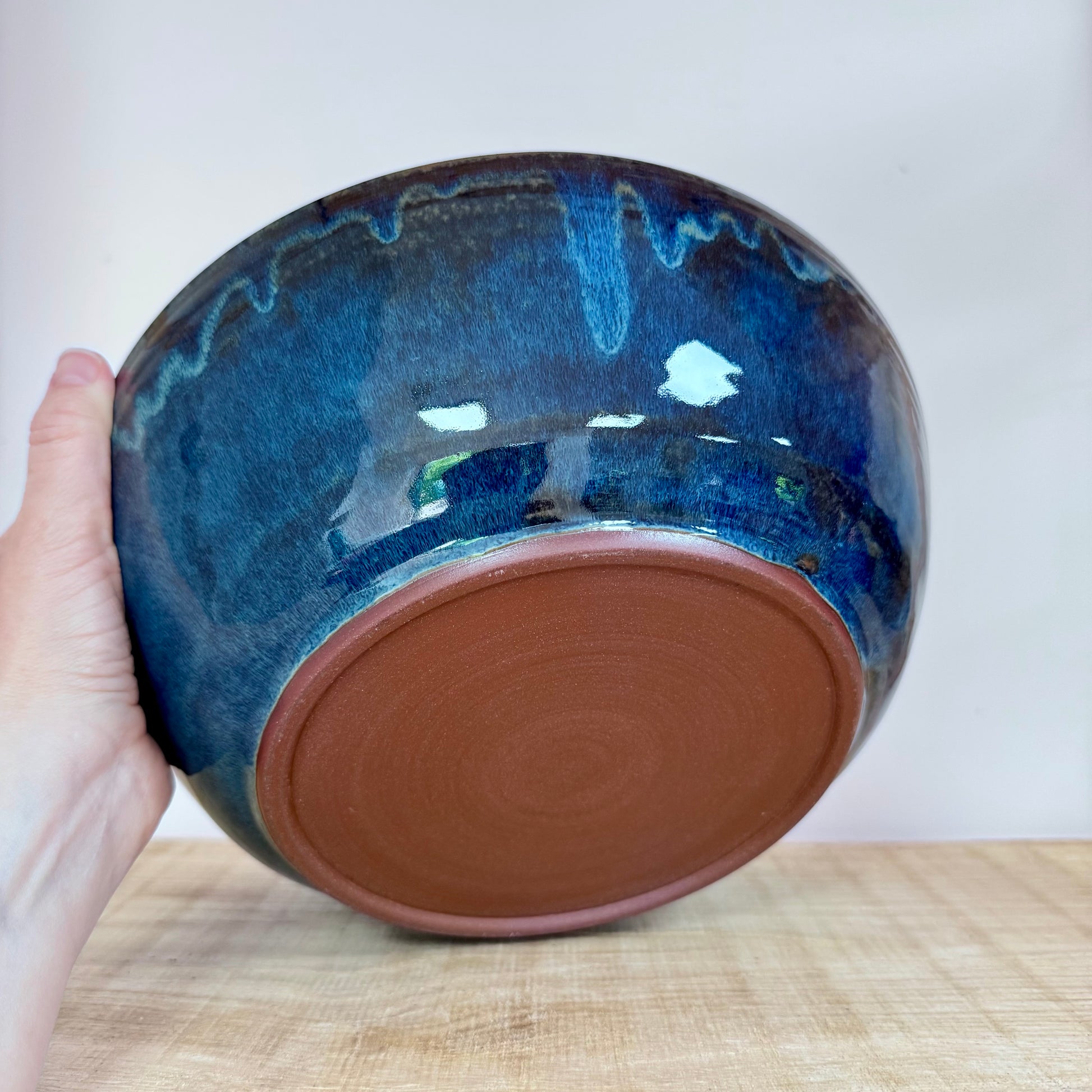 Handmde ceramic bowl carved blue inside bottom