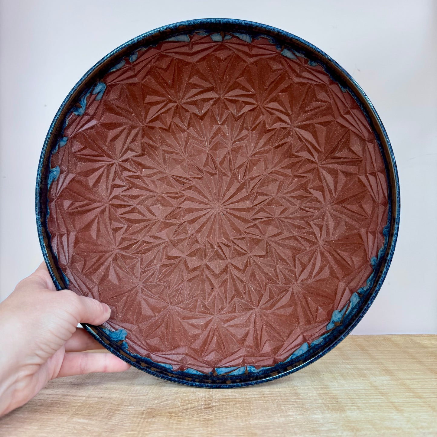 Handmde ceramic bowl carved blue inside pattern