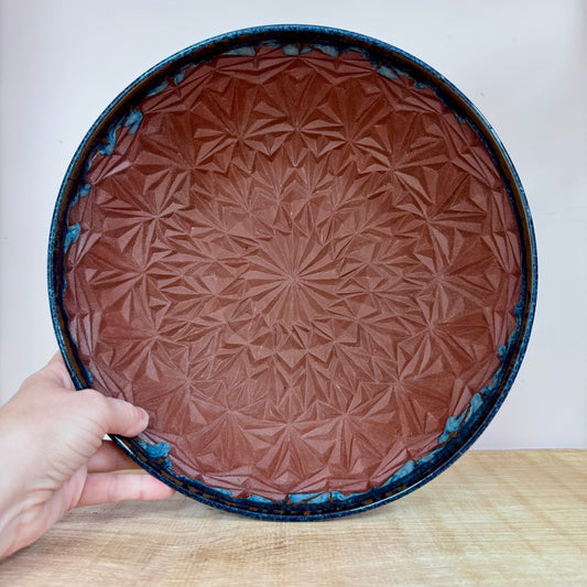 Handmde ceramic bowl carved blue inside pattern
