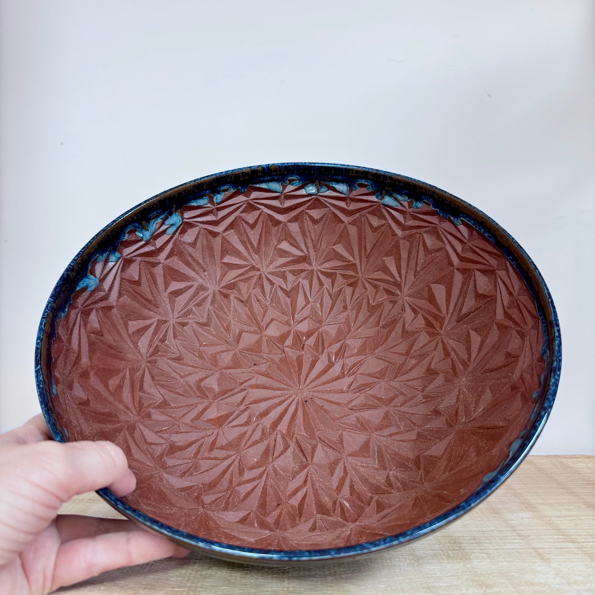 Handmde ceramic bowl carved blue inside
